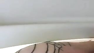 Girl in fishnet stockings spreads her ass cheeks and shits