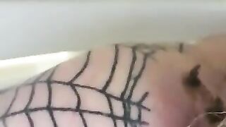 Chick in fishnets takes a big shit on the toilet