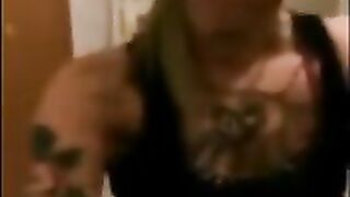 Tattooed blonde babe teasing and fingering