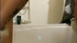 Tattooed blonde babe teasing and fingering