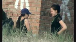 Brunette with baseball hat taking a shit