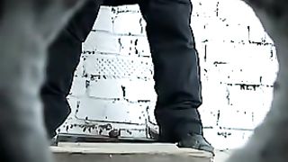 Brunette with baseball hat taking a shit