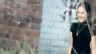 Brunette with baseball hat taking a shit