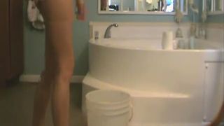 Jeniffer pooping and peeing in a bucket