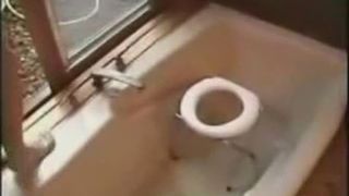 Sexy girl pooping in a bathtub