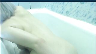 Russian blonde chick poops in the bathtub
