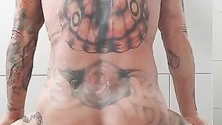 Big tits tattooed milf smearing shit