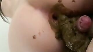 Slut pooping on the cock