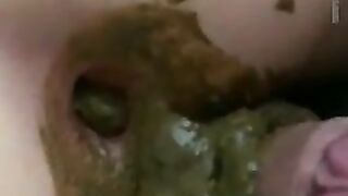 Slut pooping on the cock