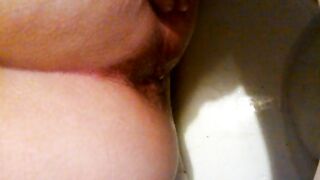 Wife showing her running poop