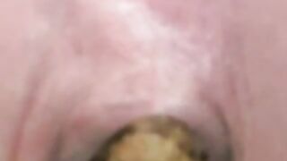 Soft yellow poop closeup