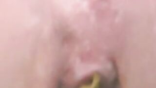 Soft yellow poop closeup