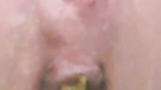 Soft yellow poop closeup