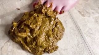 Pooping on her own feet