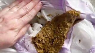 Pooping on her own feet