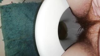 Real hairy amateur lady shitting closeup