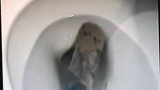Vintage video of a brunette milf shitting