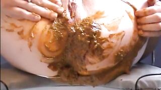 Woman shitting a big diarrhea on her white pantyhose