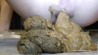 Watch her pushing that big turds