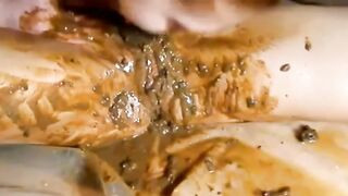 lesbians playing with shit and spit