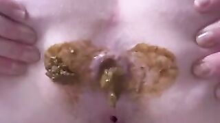 Bitch relieves herself after feeding