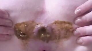 Bitch relieves herself after feeding