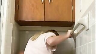 Babe squats backwards on Toilet