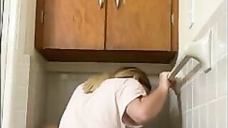 Babe squats backwards on Toilet