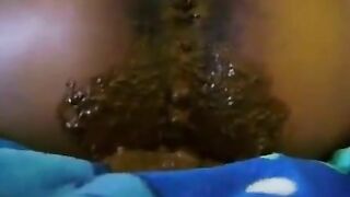 Black slut with well-hung pussy poops