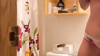 Blonde Babe Pisses her panties in bathroom