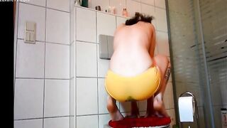 Blonde babe pooping on her yellow panty 