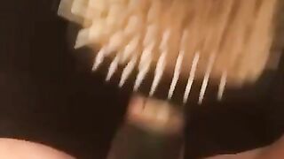 Ellis brushing then squirtin in the tub