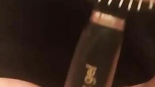 Ellis brushing then squirtin in the tub