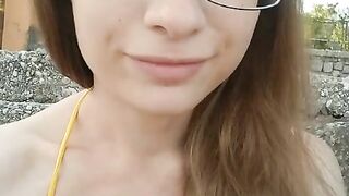 Girl Pees Secretly On A Outside Beach In A Swimsuit