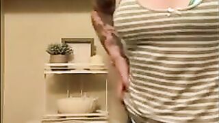 Girl shits over toilet standing up