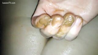 Hot girl getting wet with shit