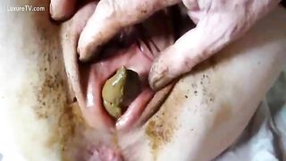 Hot slut pooping from her ass