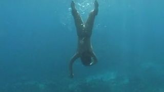 Fisting and shitting underwater