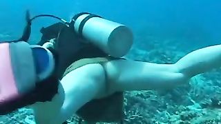 Fisting and shitting underwater
