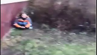 Shit behind a building
