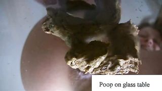 Pile of shit on a glass table