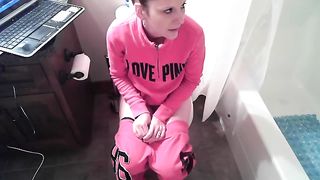 Crystal is cleaning the toilet