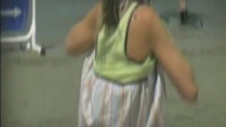 Sexy girl is pooping on Ibiza beach