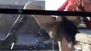 Mature woman peeing outdoor