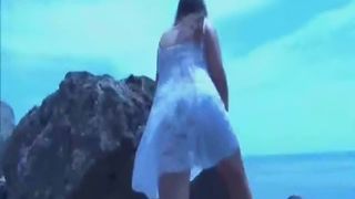 Emily pooping at the beach