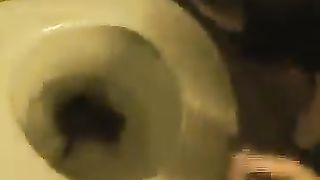 Brunette girl shitting