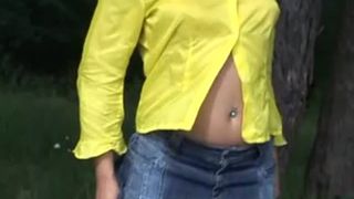 Sexy brunette pees outdoor