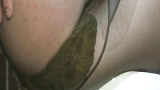 Pile of shit in her black pantyhose