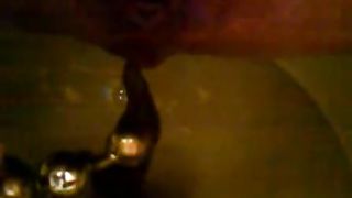 Anal beads in her shitty ass