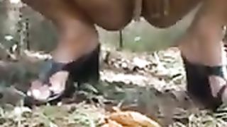 Brazilian girl pooping in the forest